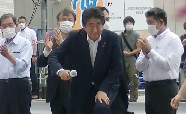 Security tackles the Shinzo Abe killer to the ground after the ex-PM is shot by a “navy veteran with a handmade gun.”