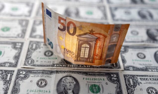 Euro slides to two-decade low as recession fears mount