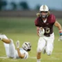 A football player from Emporia State dies after falling from a cliff