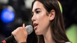 Dua Lipa stuns in a thigh-skimming miniskirt and matching jacket in photos