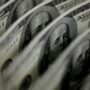 United States dollar flat in volatile trading as payrolls exceeded estimates