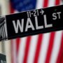 Wall Street closes a turbulent week as concerns about rate hikes