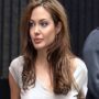 Angelina Jolie wears a tank top with a Lara Croft design during outing