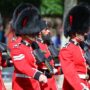 ‘Arrogant’ tourists’ shoes are kicked out of the way by the Queen’s guards