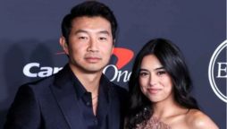 Simu Liu and his girlfriend Jade Bender display their affection on a date night