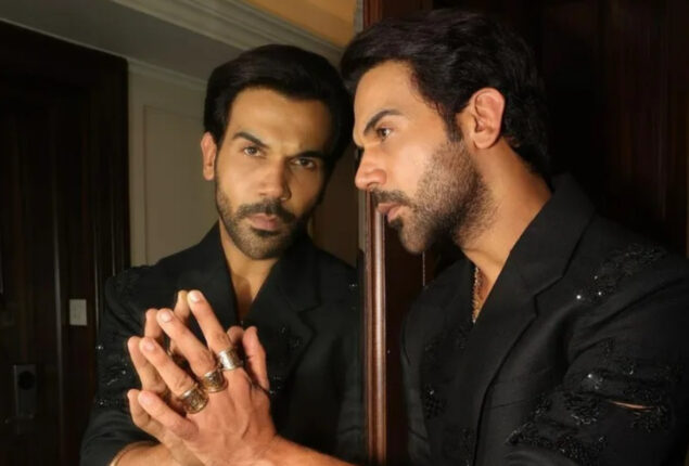 Rajkummar Rao poses in front of a mirror