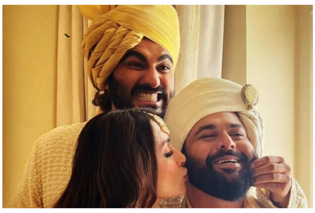 Arjun Kapoor and Malaika Arora takes pictures with groom Kunal Rawal