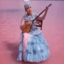 Viral Video: Kazakhstan woman plays music sitting in pink lake