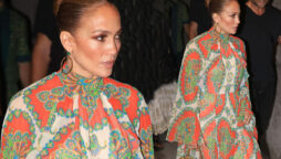 Jennifer Lopez astonished fans in bold orange dress in Capri