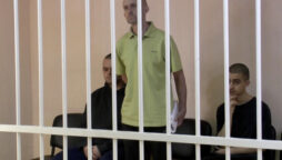 Russian occupiers set up cages in Mariupol to hold a “show trial” for prisoners of war
