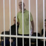 Russian occupiers set up cages in Mariupol to hold a “show trial” for prisoners of war