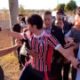 Bolsonaro, the president of Brazil, is shown in a video attempting to take the heckler’s phone   