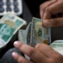 Rupee continues to bleed against dollar
