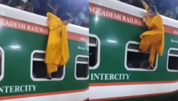 Watch what happens when a woman climbs on a crowded train