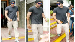 Ranbir Kapoor poses for photos in front of Karan Johar’s office