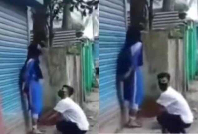 Boy begging for his true love by touching her feet