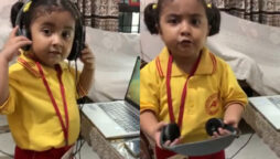 Little girl replicates her mom while she work from home