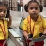 Little girl replicates her mom while she work from home