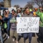 South African police charged seven men with 32 counts of rape