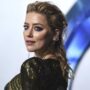 Amber Heard seated on a “throne,” ordering “young actresses” to serve Elon Musk’s friends