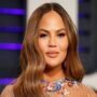 Chrissy Teigen and John Legend Don Ugly Christmas Sweaters in Adorable Family Photo