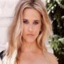 Reese Witherspoon dismisses rumours of a fight with Jennifer Aniston over an Emmy nomination.