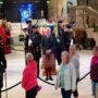 Numerous people stand in line all night to pay their respects as they pass the Queen’s casket