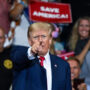 On his social media, Trump promotes QAnon-related posts