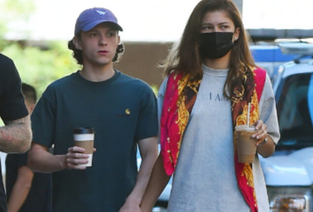 Zendaya and Tom Holland hold hands