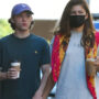 Zendaya and Tom Holland hold hands