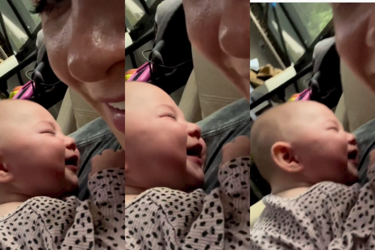 baby bursts laughing