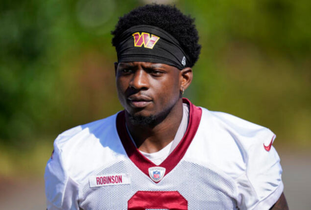 Brian Robinson resumes training after being shot twice