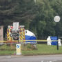 Woman found dead at roundabout, man arrested