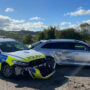 Tractor rams police cars, thwarting murder arrest