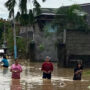 Philippines typhoon kills five rescuers