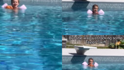 Watch: little kid who sings very loudly whilelittle kid  in indoor pool