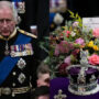 King Charles places handwritten note on Queen’s coffin