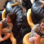Viral: Girl watches TV with 12 foot long python