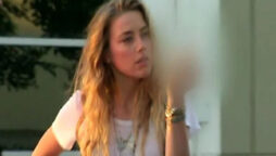 Amber Heard shows mid finger on National Television