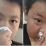 Chinese boy claims to be allergic to smell of books