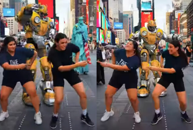 Indian Women Perform Bhangra in Times Square with Bumblebee Robot