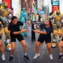 Indian Women Perform Bhangra in Times Square with Bumblebee Robot