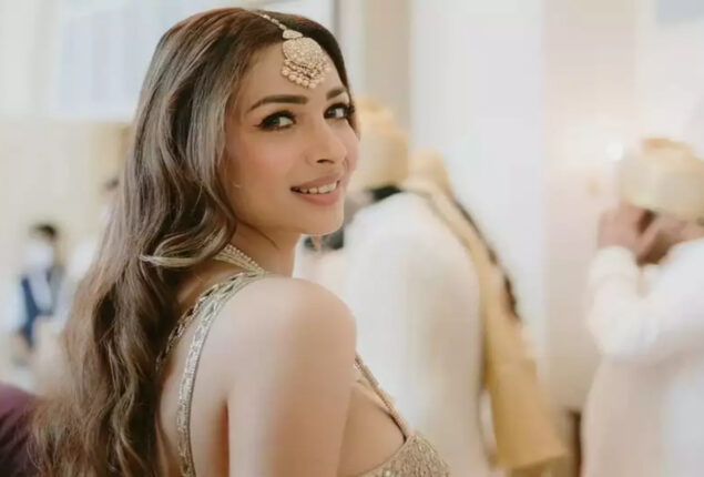 Malaika Arora looks dazzling in white with mang tikka