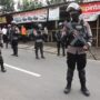 Gun-wielding woman detained outside the Indonesian presidential palace