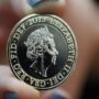 Unveiling of a new coin with a picture of Queen Elizabeth