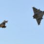 China-based former US military pilot detained in Australia