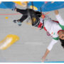 Iranian rock climber returns to Tehran after competing hijab-free