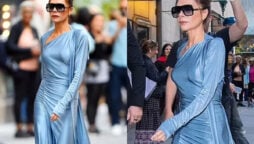 Victoria Beckham looks glamorous in blue metallic dress