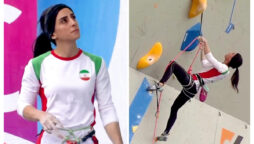 Elnaz Rekabi, an Iranian rock climber, greets supporters