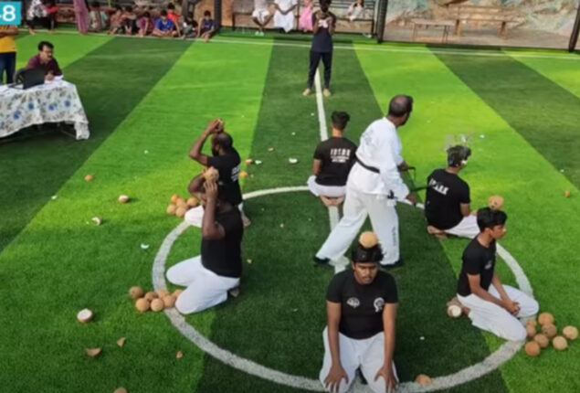 Martial artist smash coconuts with nunchaku on volunteers’ heads